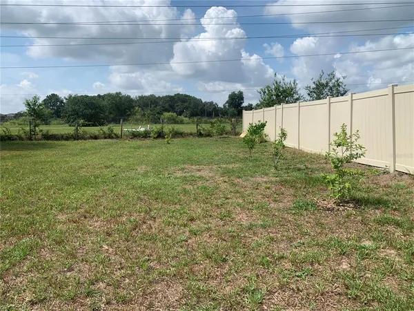 a view of outdoor space and yard