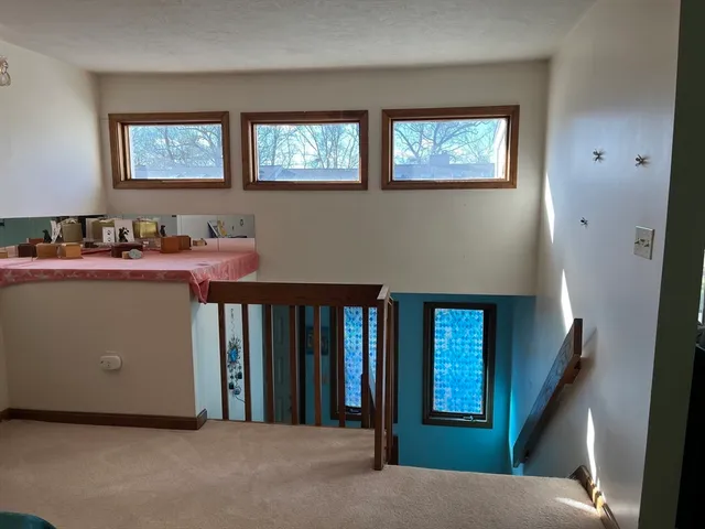 a view of livingroom with furniture and window