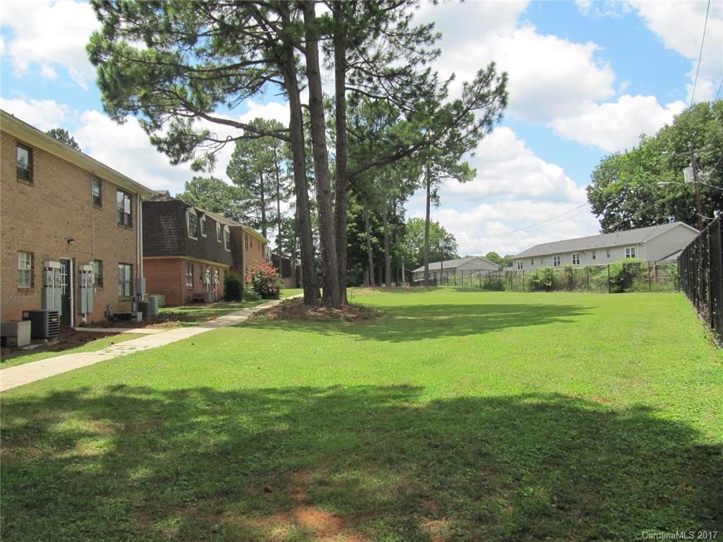 5803 Hunting Ridge Lane, Unit B Charlotte, NC 28212 - Photo 14 of 15 a view of a house with a big yard
