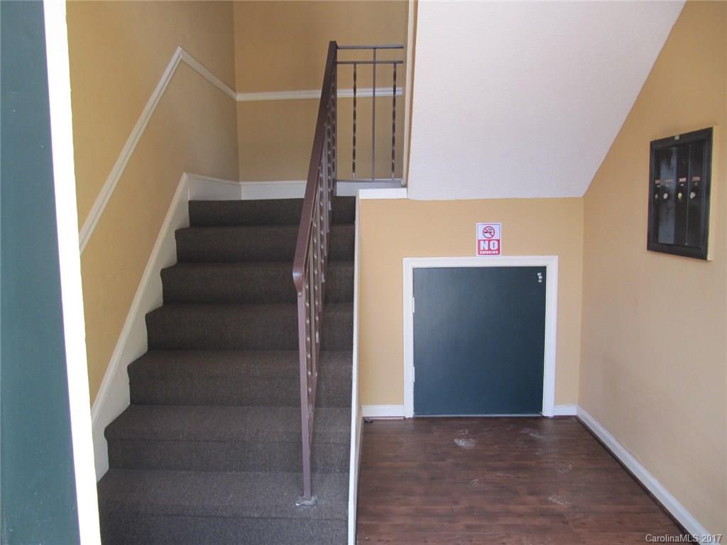 5803 Hunting Ridge Lane, Unit B Charlotte, NC 28212 - Photo 3 of 15 a view of entryway and hall with wooden floor