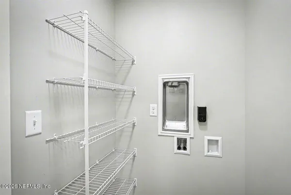 a view of a walk in closet