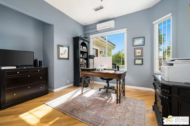 a view of a workspace with furniture