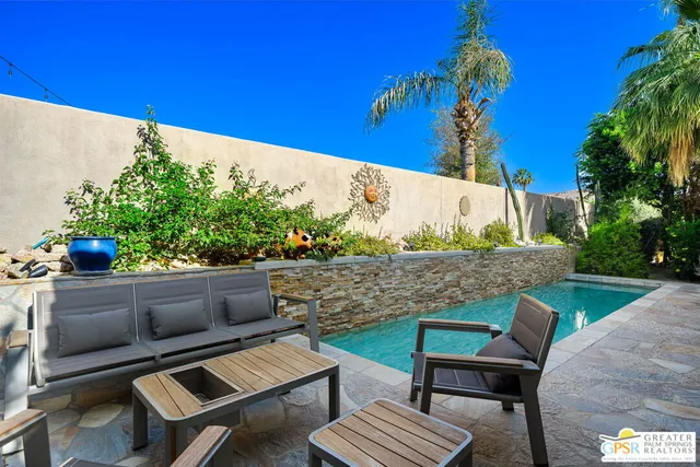 a view of yard from outdoor seating