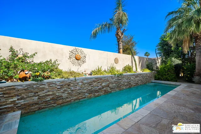 a view of a yard with an outdoor space