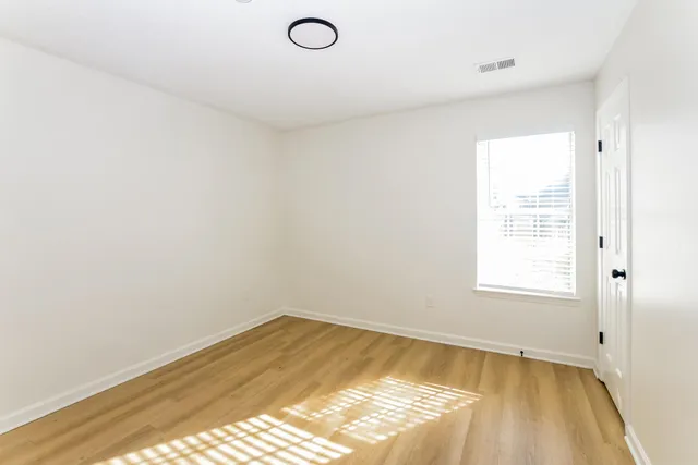 a view of a room with a window