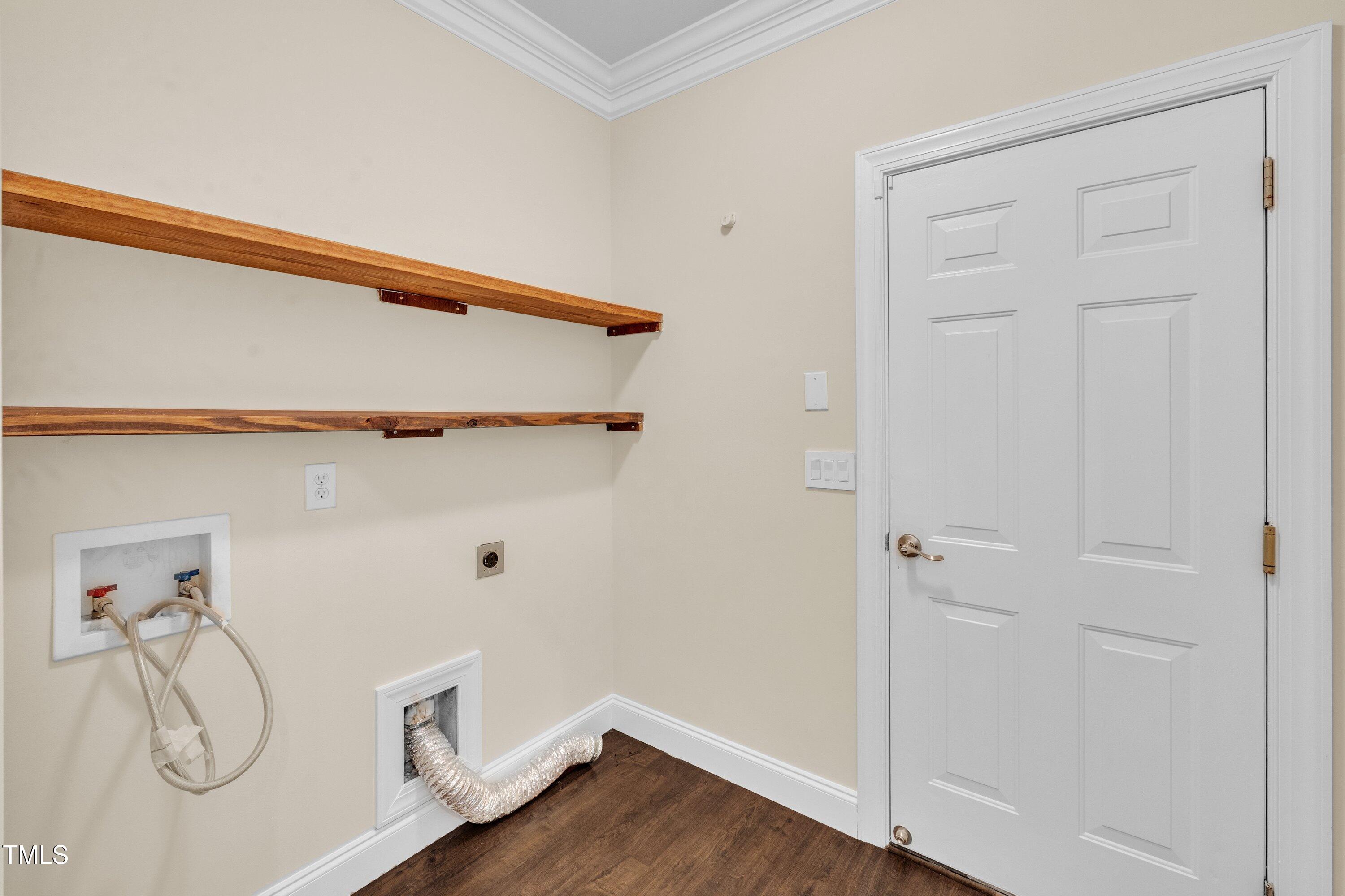 1400 Crete Drive Raleigh, NC 27606 - Photo 25 of 56 a view of an entryway with wooden floor