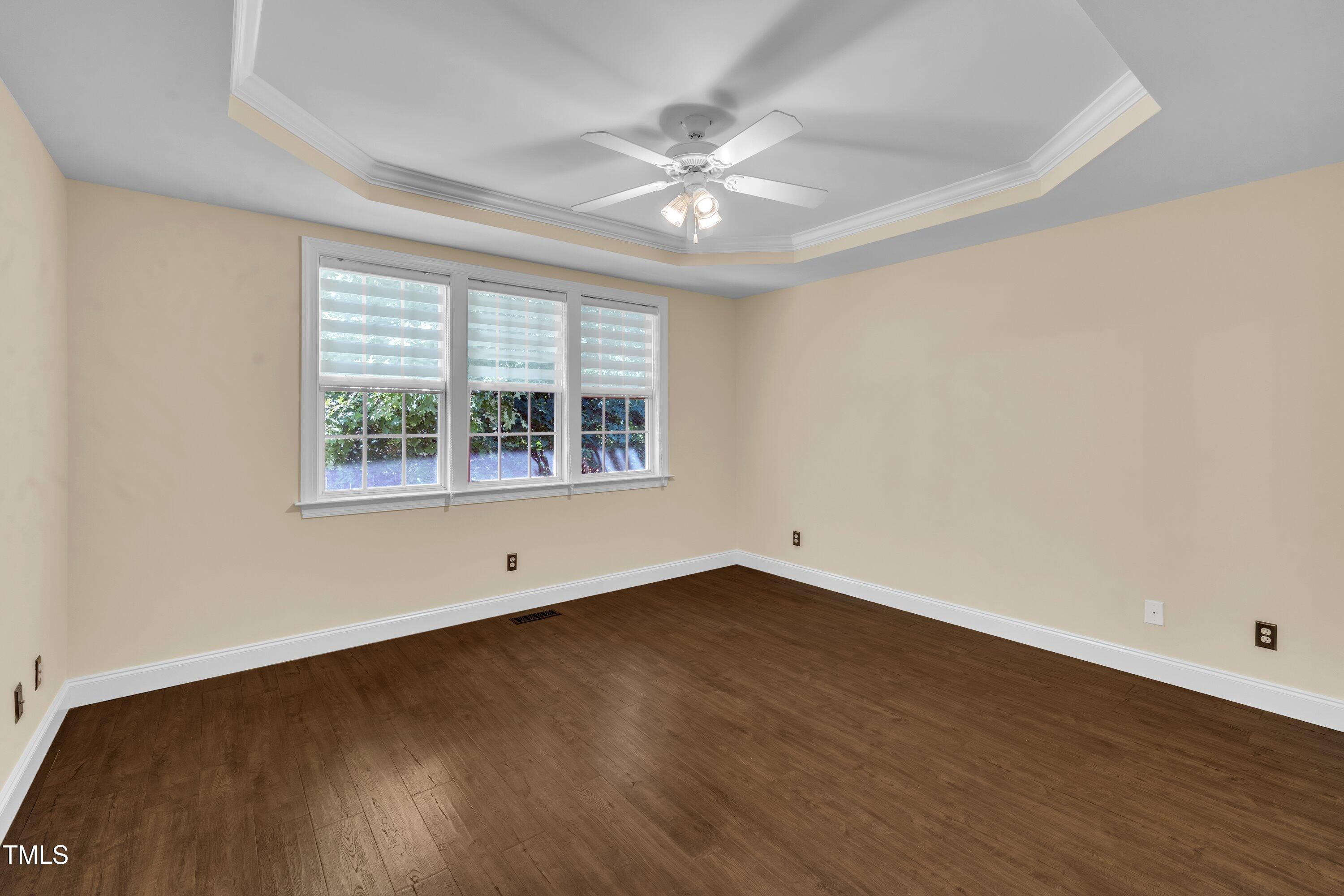 1400 Crete Drive Raleigh, NC 27606 - Photo 26 of 56 wooden floor in an empty room with a window