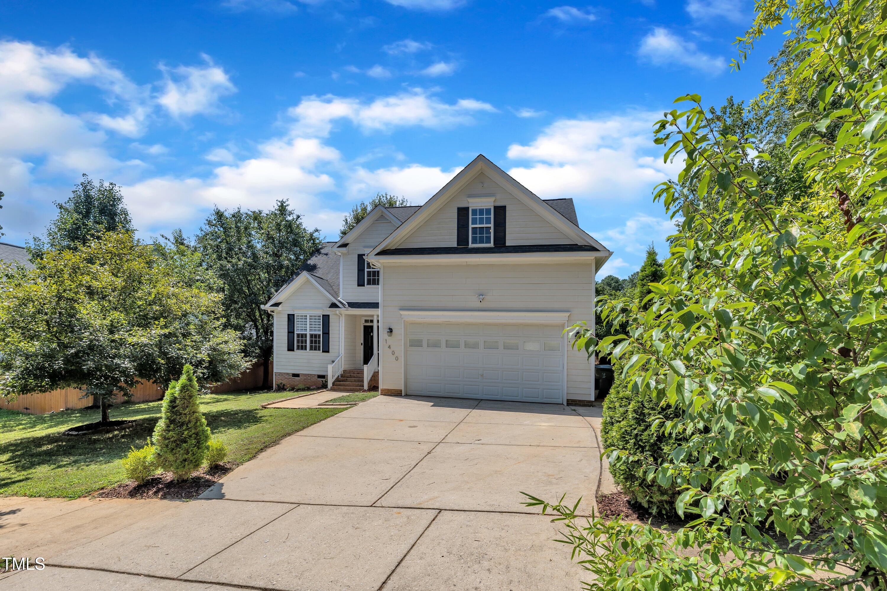 1400 Crete Drive Raleigh, NC 27606 - Photo 54 of 56 a front view of a house with a yard