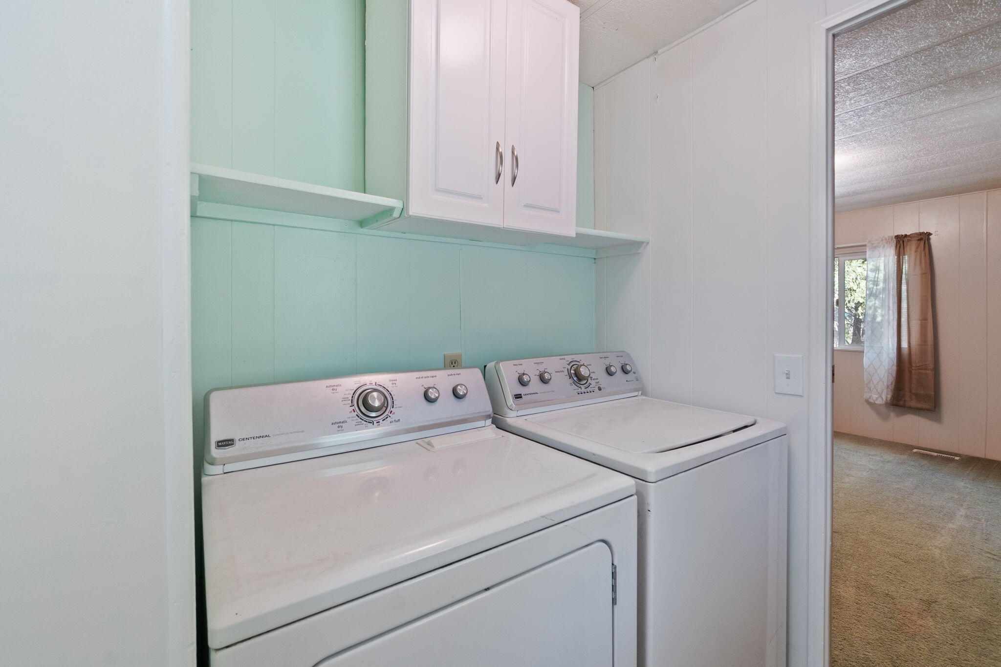 7517 Brett Road Shingletown, CA 96088 - Photo 11 of 26 a utility room with dryer and washer