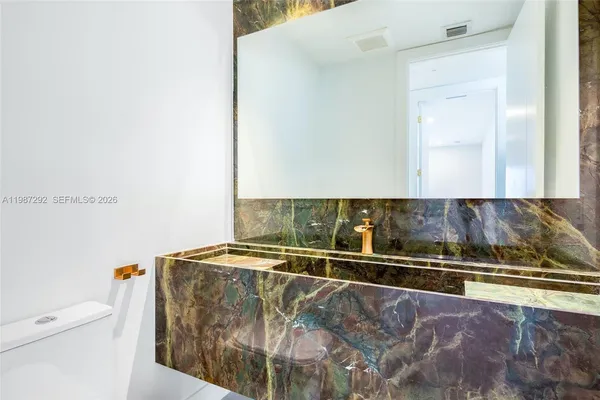 a view of a bathroom with a sink and a toilet