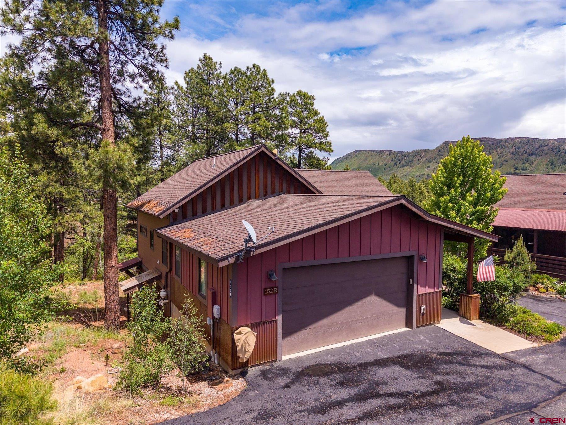 152 Red Canyon Trail, Unit R Durango, CO 81301 - Photo 1 of 42 a house with trees in the background