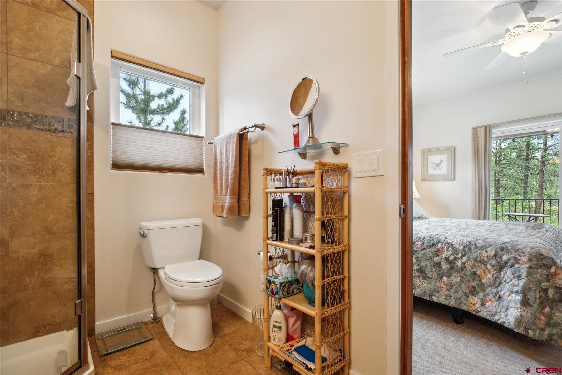 152 Red Canyon Trail, Unit R Durango, CO 81301 - Photo 21 of 42 a bathroom with a toilet and a sink