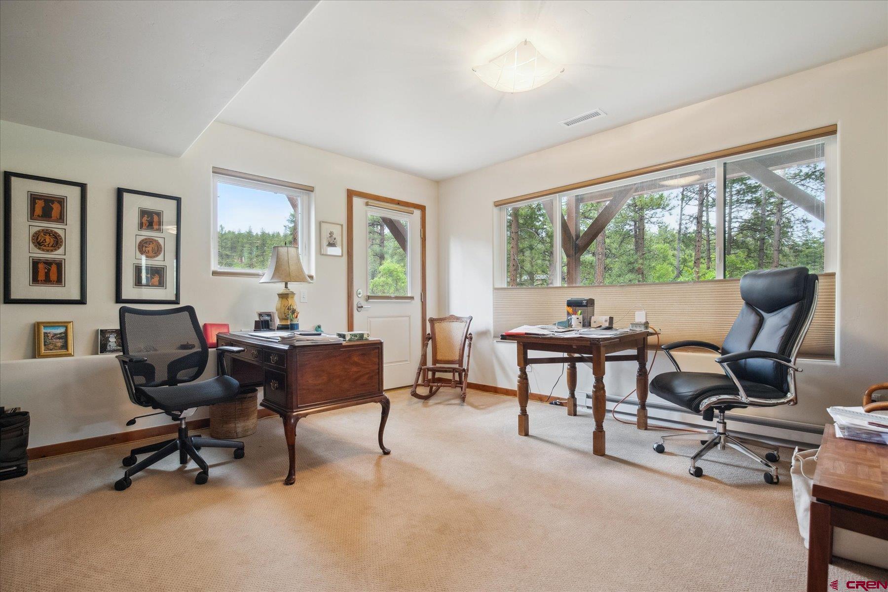 152 Red Canyon Trail, Unit R Durango, CO 81301 - Photo 25 of 42 a living room with furniture and floor to ceiling windows