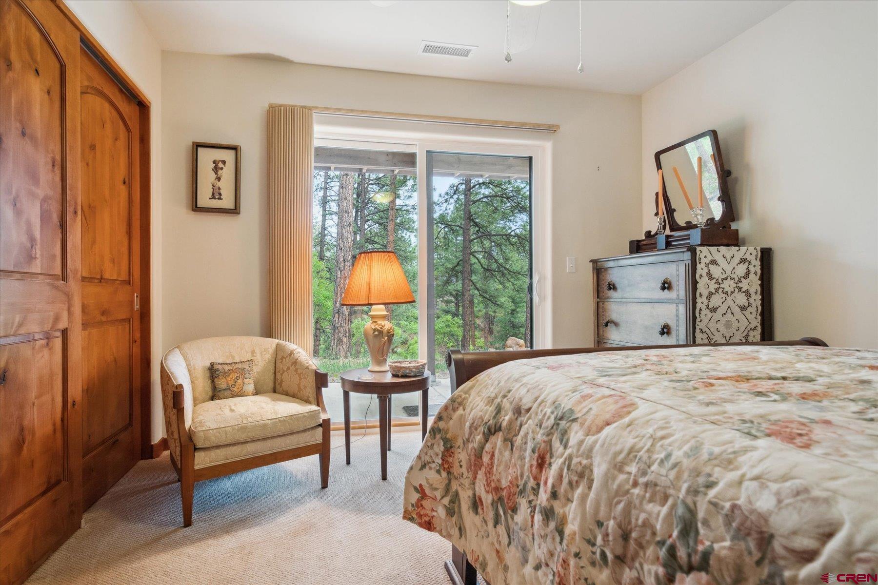 152 Red Canyon Trail, Unit R Durango, CO 81301 - Photo 26 of 42 a bedroom with a bed and a window