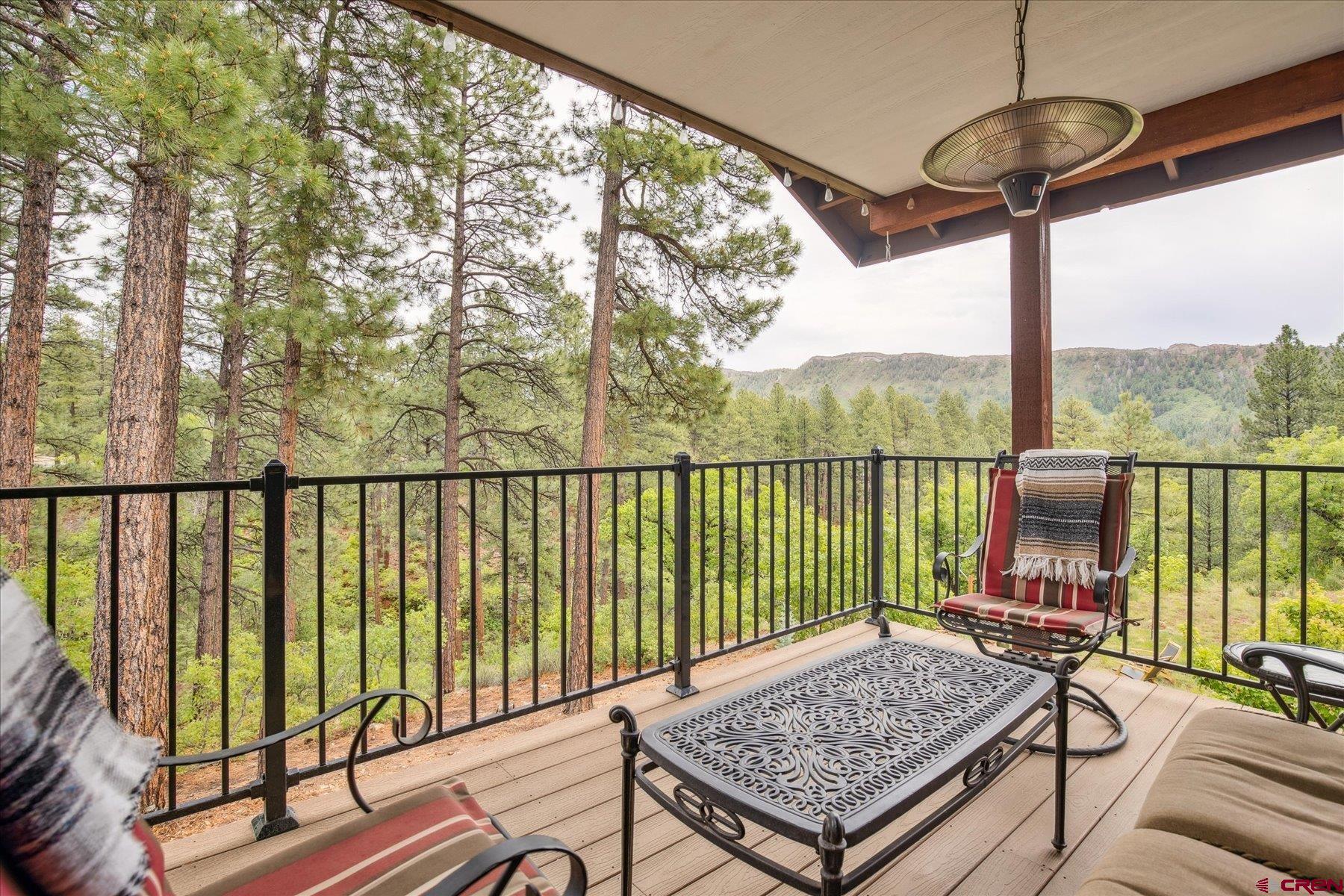 152 Red Canyon Trail, Unit R Durango, CO 81301 - Photo 33 of 42 a view of a two chairs in the deck