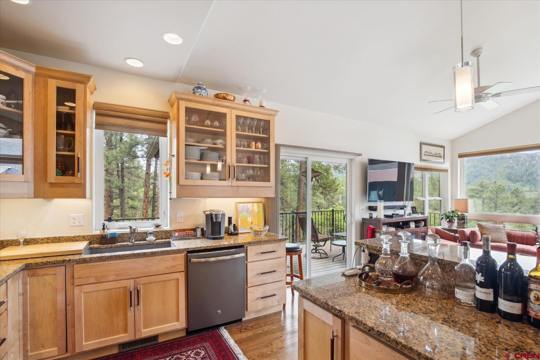 152 Red Canyon Trail, Unit R Durango, CO 81301 - Photo 5 of 42 a kitchen with sink refrigerator and large window