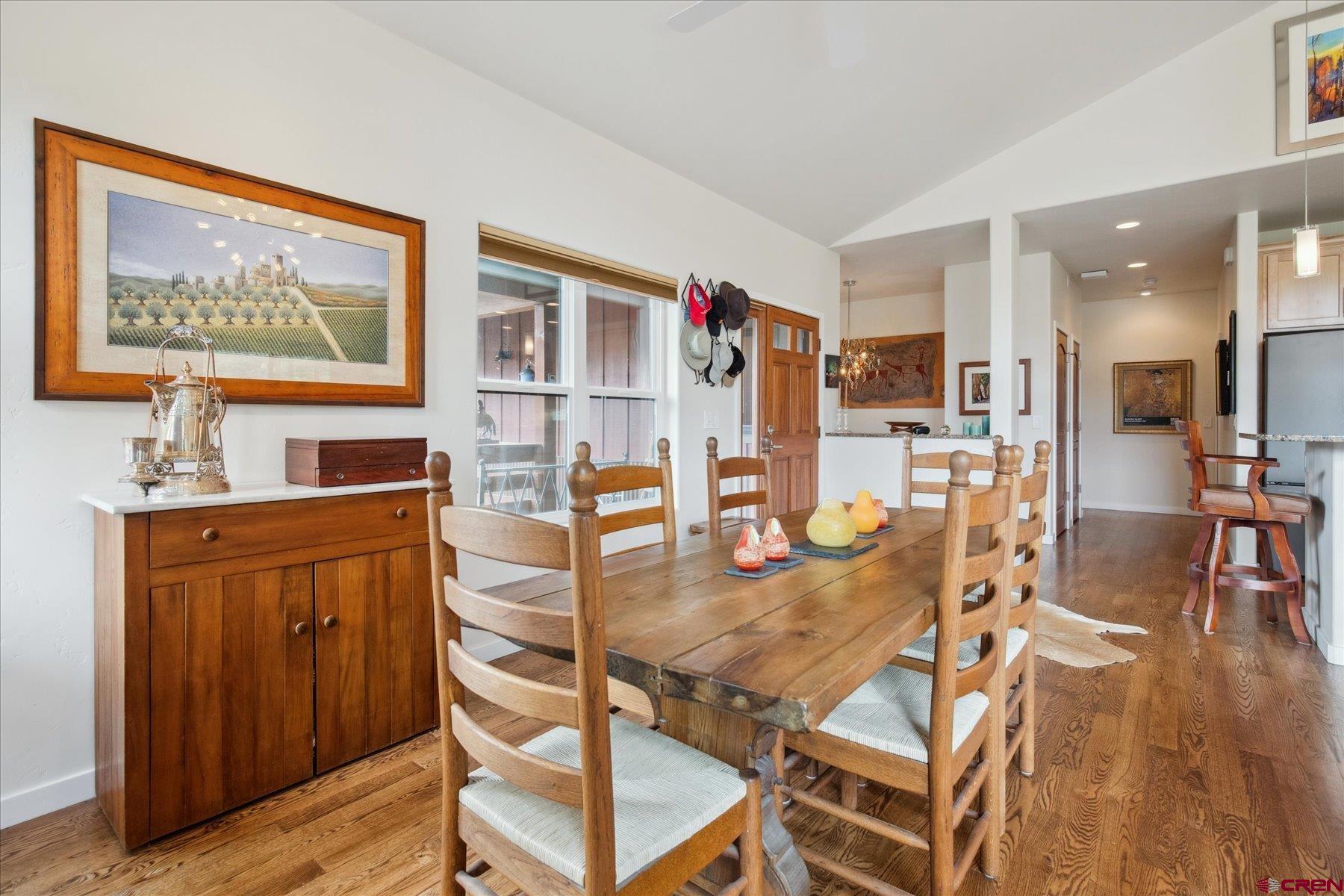152 Red Canyon Trail, Unit R Durango, CO 81301 - Photo 8 of 42 a dining room with furniture and wooden floor