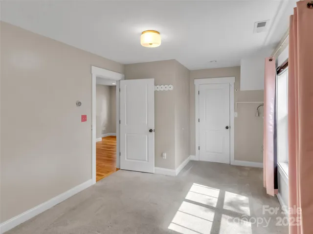 a bathroom with a granite countertop sink and a mirror a bathtub