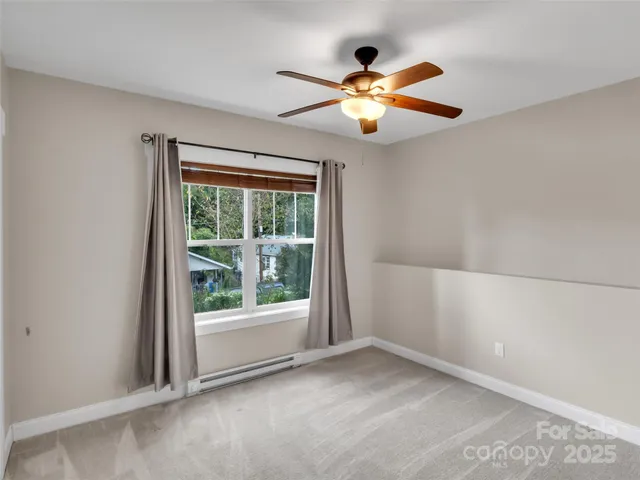 a backyard of a house with outdoor seating