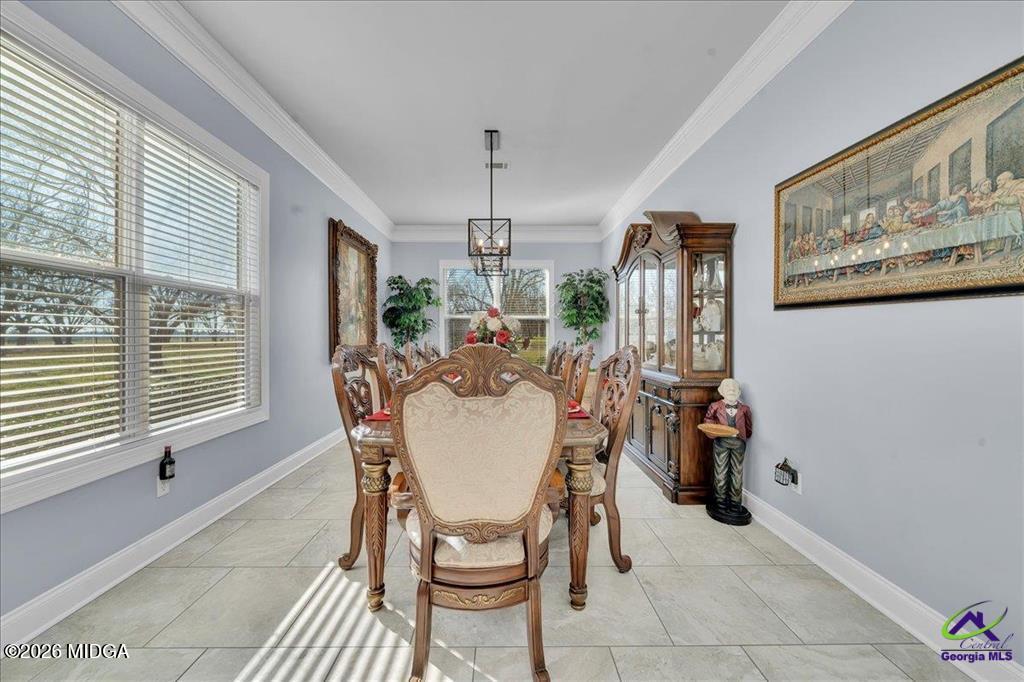 706 Orr Road Fort Valley, GA 31030 - Photo 15 of 50 a dining room with furniture and window