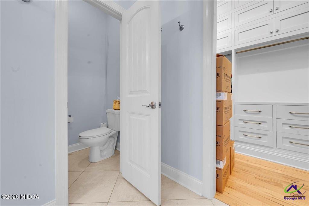 706 Orr Road Fort Valley, GA 31030 - Photo 34 of 50 a bathroom with a toilet and a shower