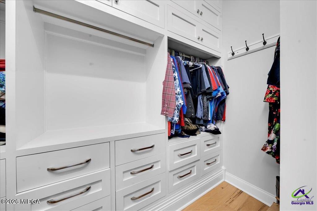 706 Orr Road Fort Valley, GA 31030 - Photo 35 of 50 a view of walk in closet with clothes and shoes