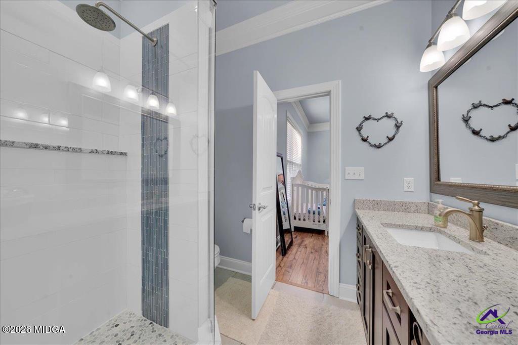 706 Orr Road Fort Valley, GA 31030 - Photo 42 of 50 a bathroom with a granite countertop sink a mirror and shower