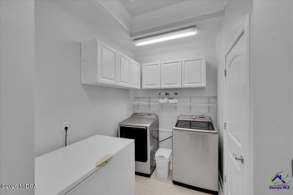706 Orr Road Fort Valley, GA 31030 - Photo 43 of 50 a utility room with sink dryer and washer