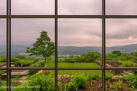 a view of a lake with a garden