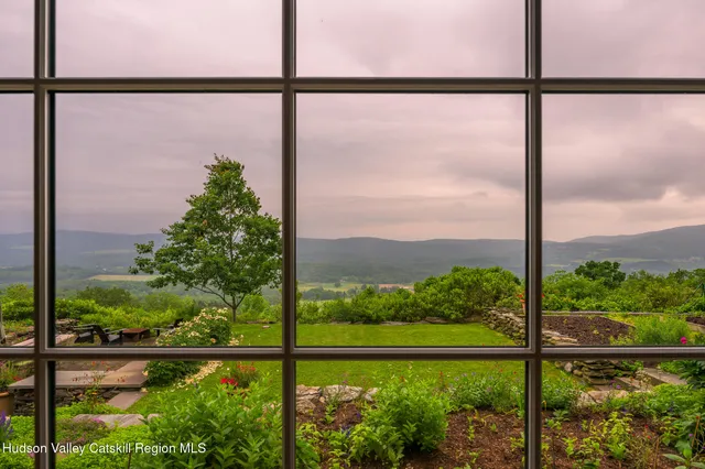 a view of a lake with a garden