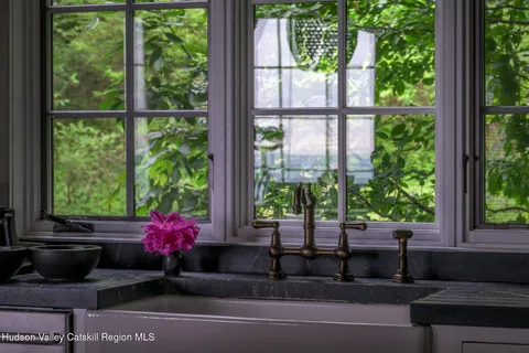 a room with gym equipment and a large window