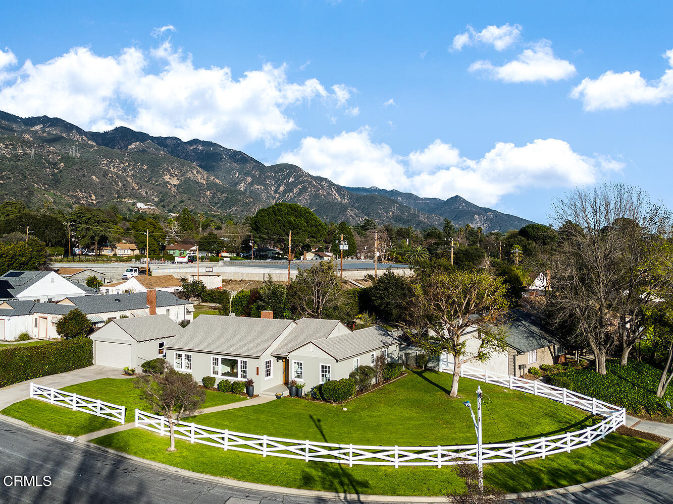 211 West Poppyfields Drive Altadena, CA 91001 - Photo 1 of 45 a view of a swimming pool with a garden