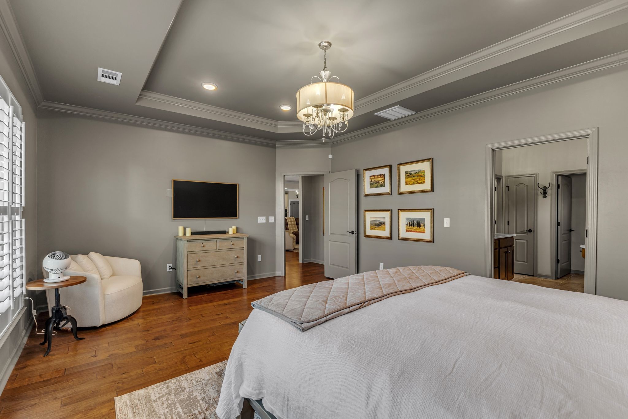 1121 Davidson Walk Spring Hill, TN 37174 - Photo 16 of 27 a bedroom with a bed and a chandelier