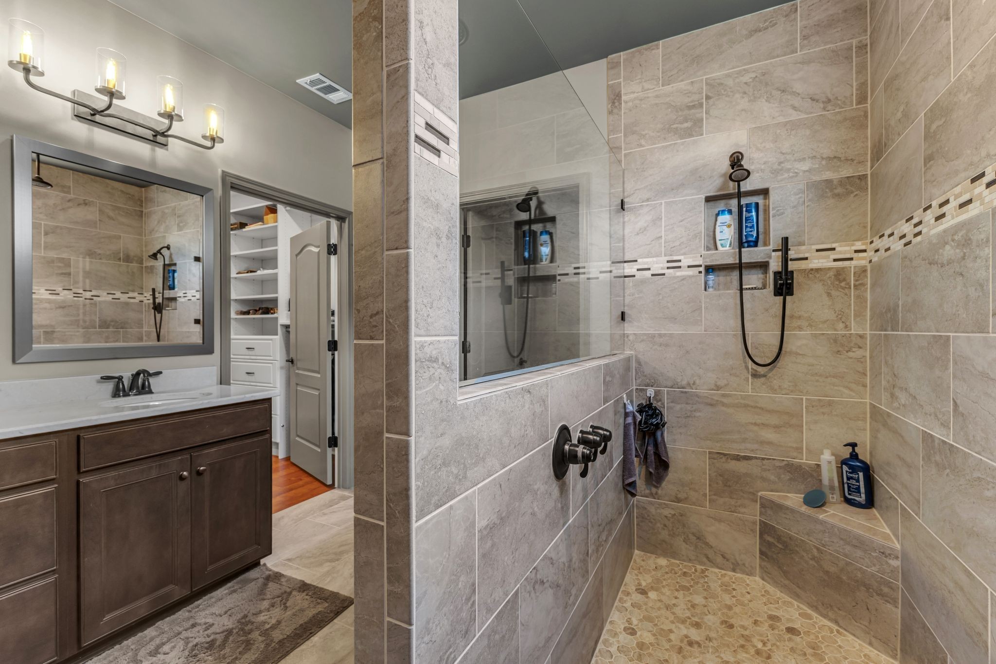 1121 Davidson Walk Spring Hill, TN 37174 - Photo 18 of 27 a bathroom with a tub sink shower and mirror