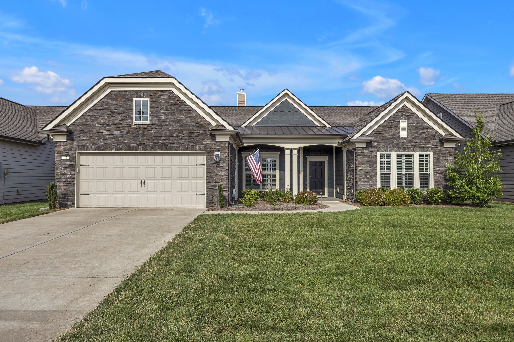 1121 Davidson Walk Spring Hill, TN 37174 - Photo 2 of 27 a front view of a house with a yard