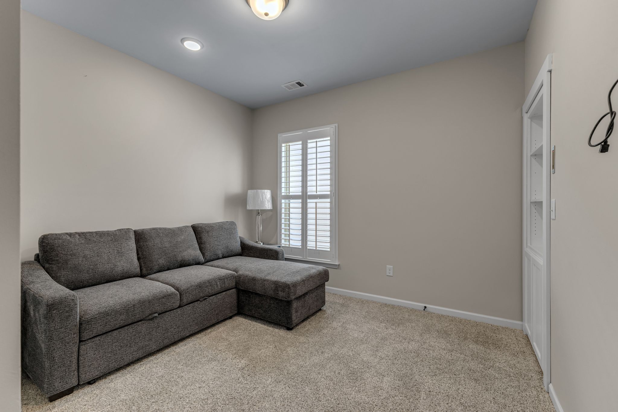 1121 Davidson Walk Spring Hill, TN 37174 - Photo 24 of 27 a living room with furniture and a window