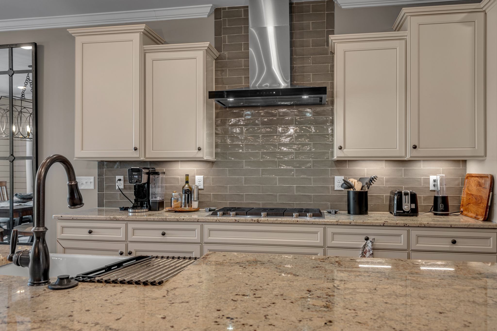 1121 Davidson Walk Spring Hill, TN 37174 - Photo 9 of 27 a kitchen with stainless steel appliances kitchen island granite countertop a sink and cabinets