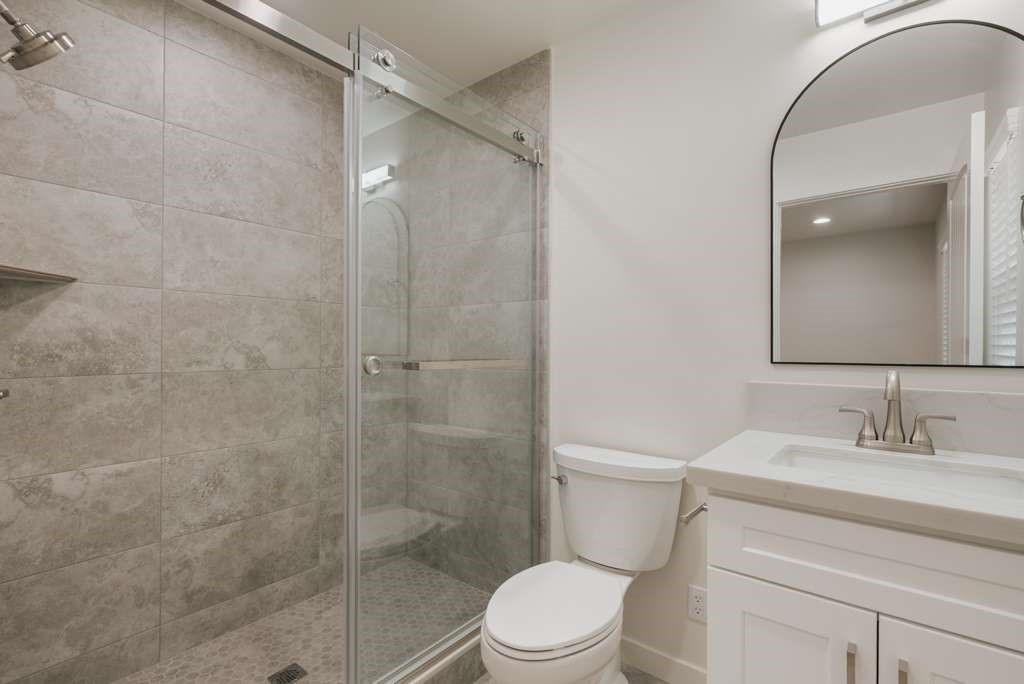 1806 South 8th Street, Unit B Alhambra, CA 91803 - Photo 40 of 44 a bathroom with a sink a toilet and shower