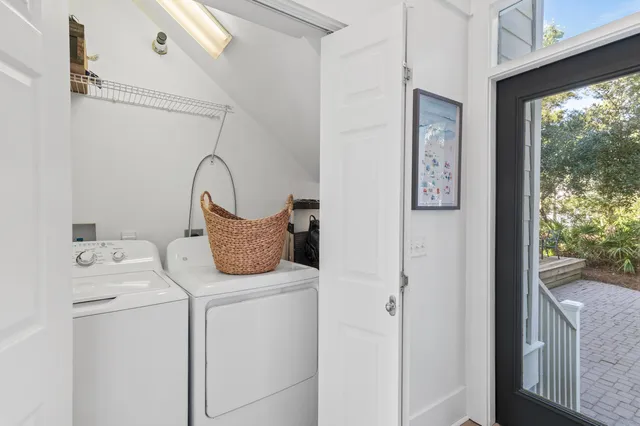 a utility room with dryer and washer