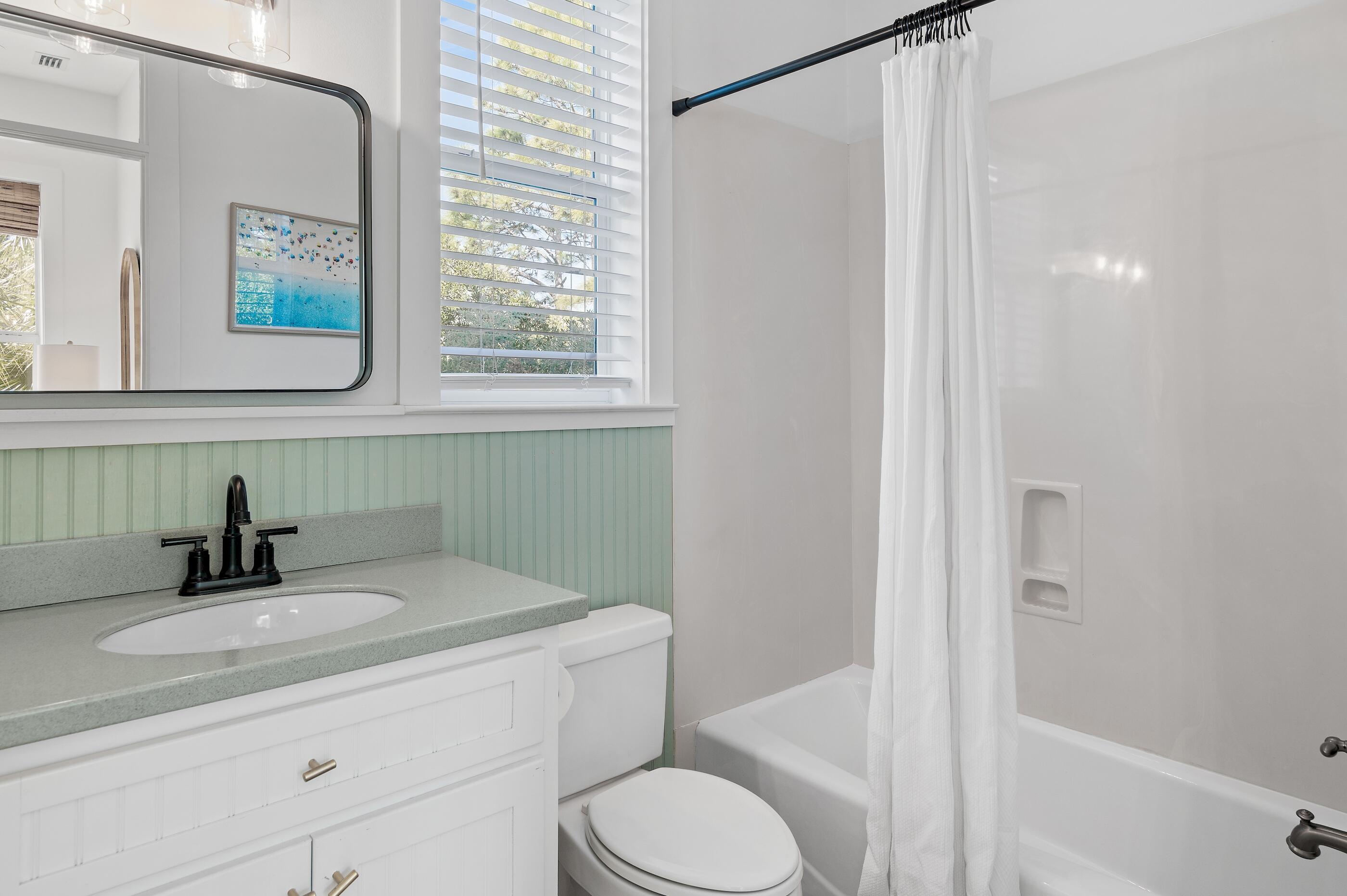 348 Lakewood Drive Santa Rosa Beach, FL 32459 - Photo 22 of 46 a bathroom with a sink toilet and shower