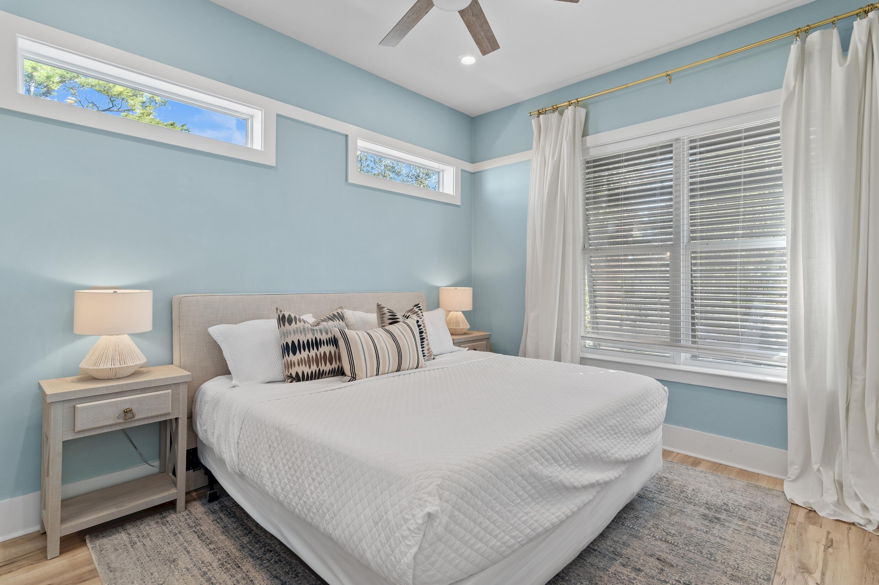 348 Lakewood Drive Santa Rosa Beach, FL 32459 - Photo 23 of 46 a bedroom with a bed and a window