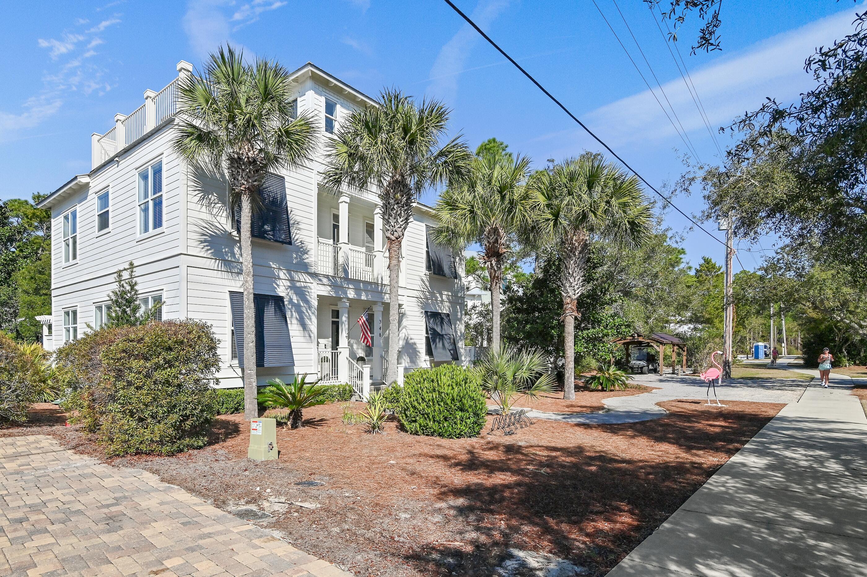 348 Lakewood Drive Santa Rosa Beach, FL 32459 - Photo 45 of 46 a view of a street with a building in the background