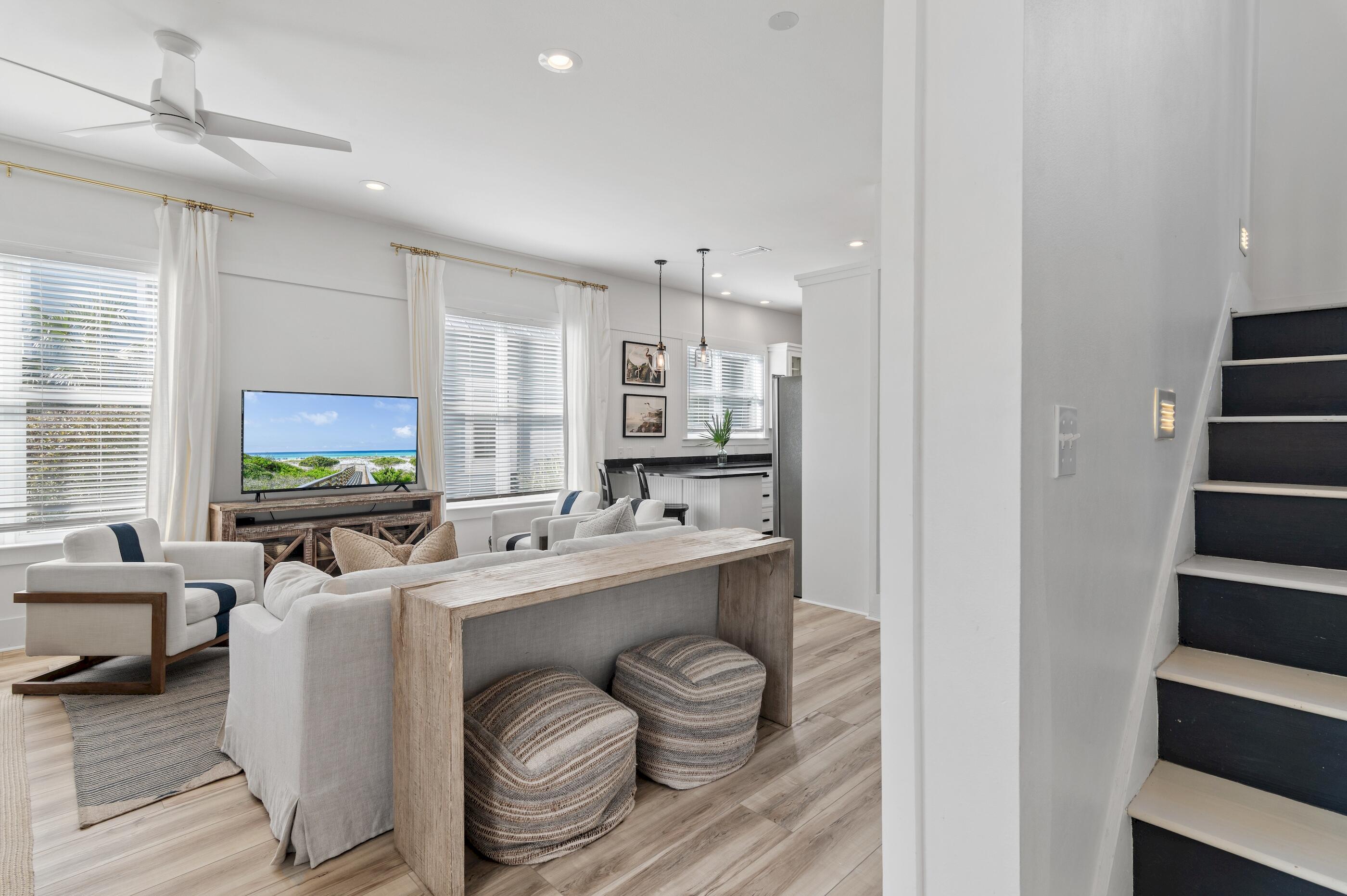 348 Lakewood Drive Santa Rosa Beach, FL 32459 - Photo 6 of 46 a living room with furniture and a flat screen tv