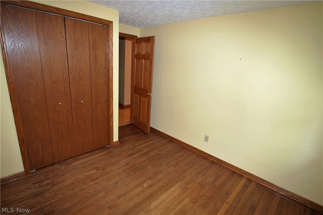 4202 Laubert Road Atwater, OH 44201 - Photo 17 of 31 Bedroom #4 hardwood flooring