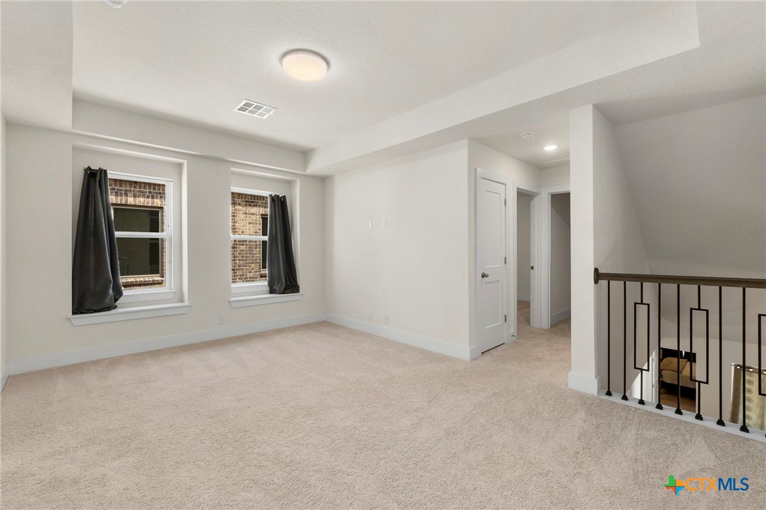 1845 Nettletree Road New Braunfels, TX 78132 - Photo 22 of 33 an empty room with windows