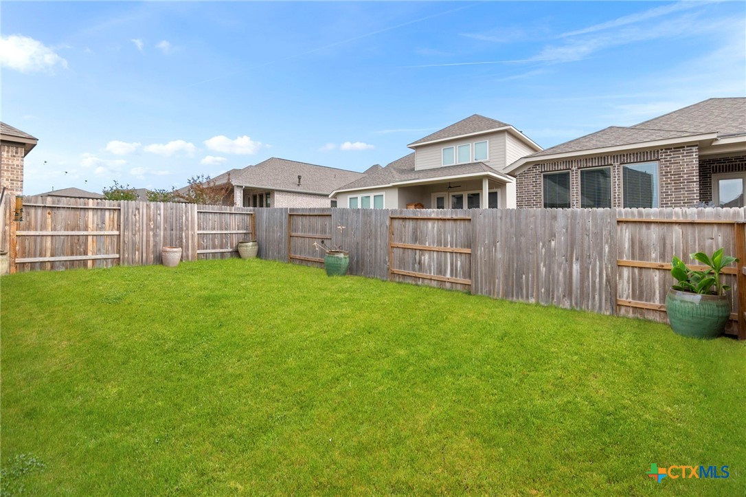 1845 Nettletree Road New Braunfels, TX 78132 - Photo 33 of 33 a front view of a house with a yard and porch