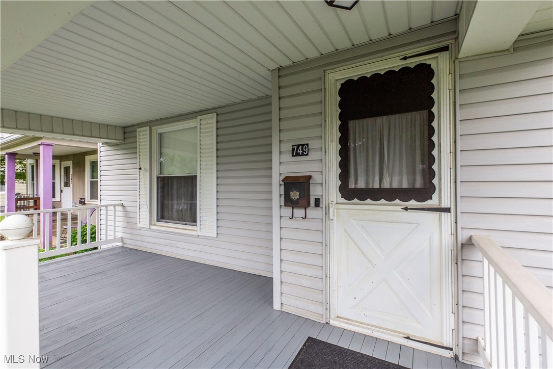 749 Amherst Road Northeast Massillon, OH 44646 - Photo 38 of 41 View of exterior entry featuring covered porch