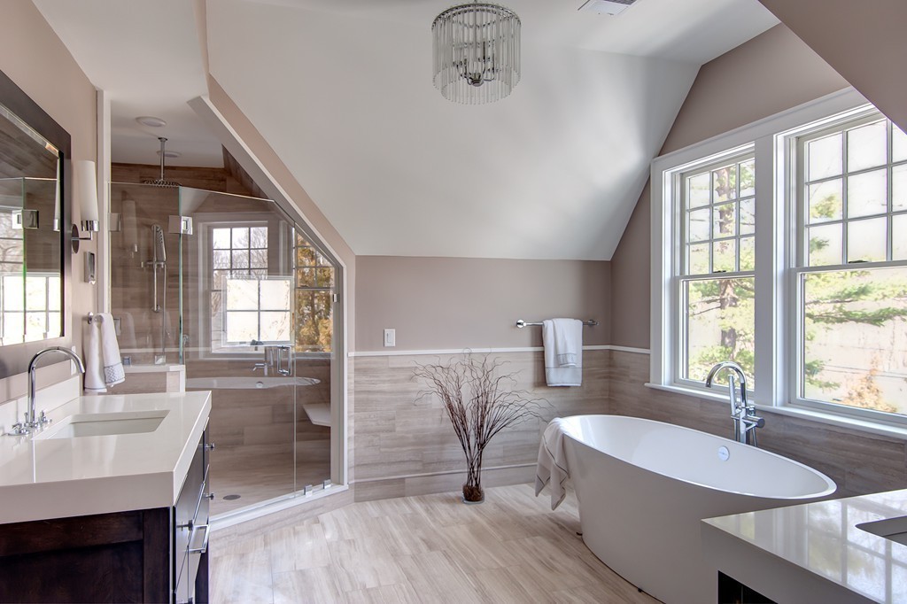 65 White Oak Road Wellesley, MA 02481 - Photo 17 of 28 a spacious bathroom with a double vanity sink a mirror and a bathtub