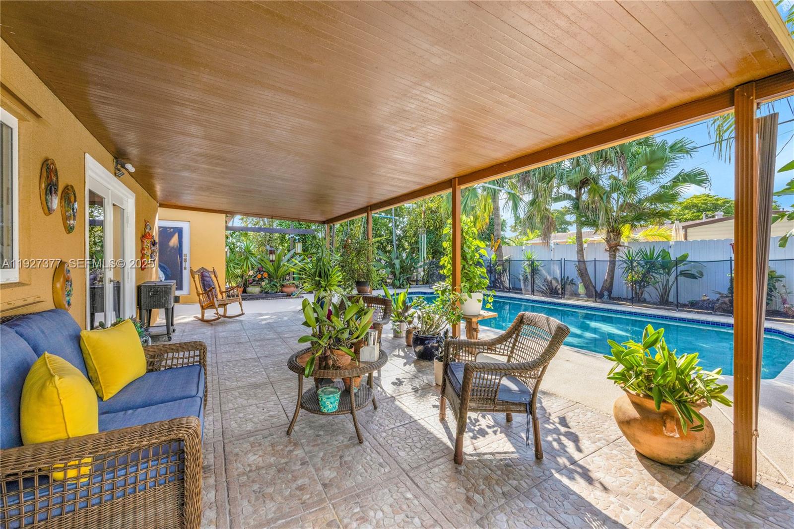 4110 West 7th Lane Hialeah, FL 33012 - Photo 11 of 24 a outdoor space with furniture and garden view