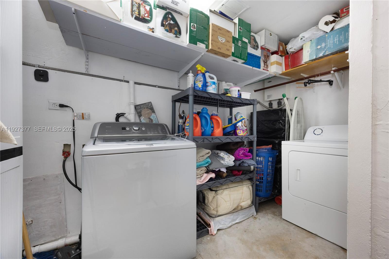 4110 West 7th Lane Hialeah, FL 33012 - Photo 19 of 24 a utility room with dryer and washer
